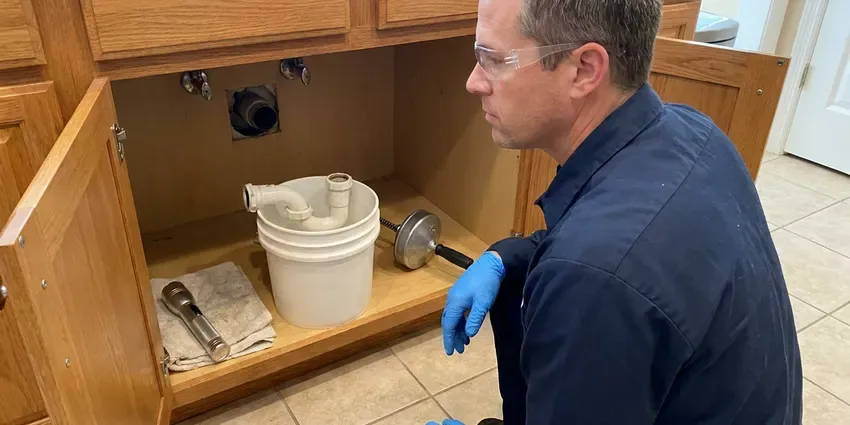 GLN Plumbing technician providing water heater maintenance in Newark